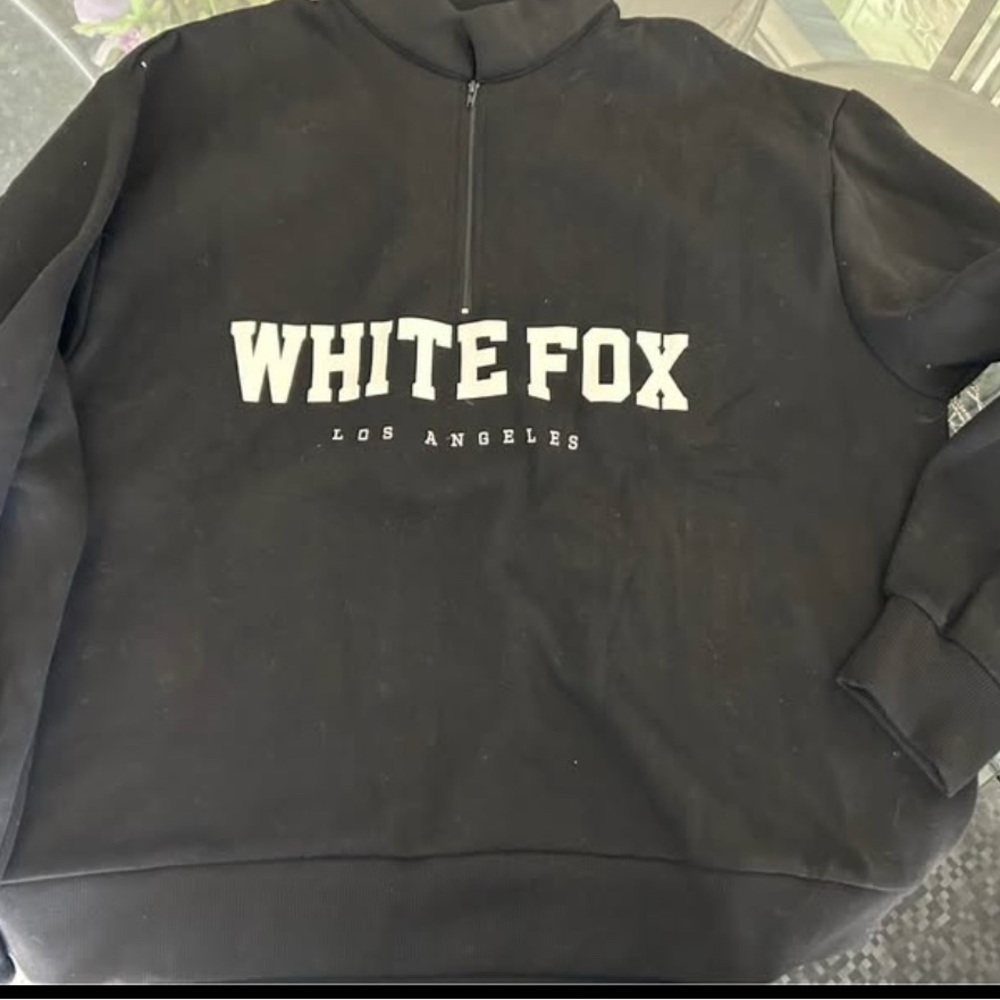 White Fox Boutique Black Sweatshirt with High Collar and Quarter-Zip